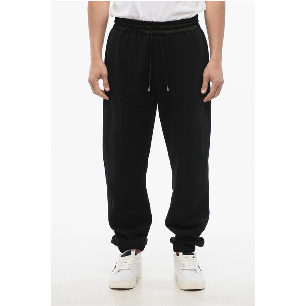 Saint Laurent Cuffed Fleeced Cotton Sweatpants with Nylon Detail