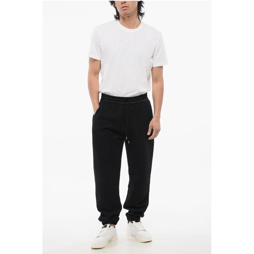Saint Laurent Cuffed Fleeced Cotton Sweatpants with Nylon Detail - Image 4
