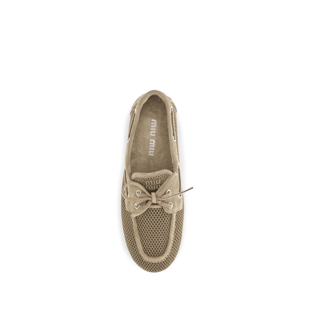Miu Miu Beige Calf Leather Bos Taurus Slip-On Loafers - Image 4